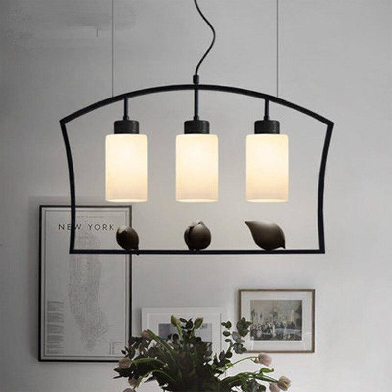 pendant light industrial with bird perched Bird