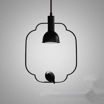 pendant light industrial with bird perched Bird