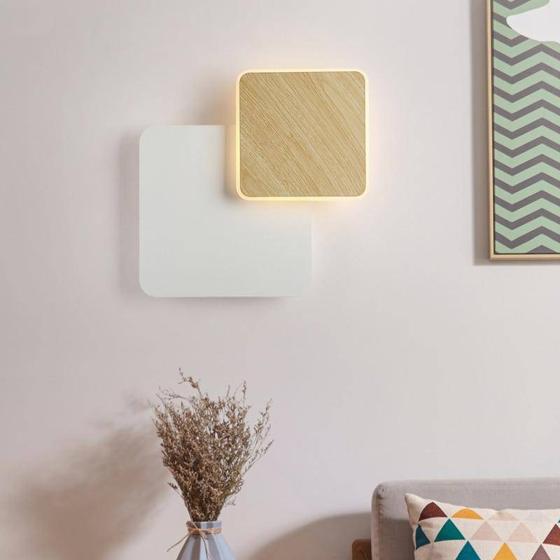 Moderno aplique LED con dos bases geométricas de madera y metal