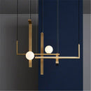 Suspension LED aux formes géométriques design et finitions cuivrées