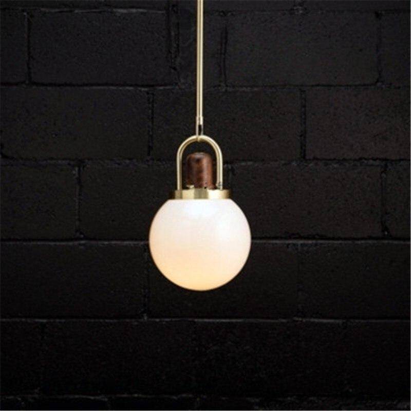 Lámpara de suspensión design Bola de LED en vidrio y metal dorado estilo madera