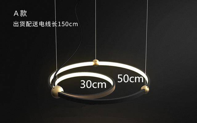 Design chandelier with LED rings and golden balls