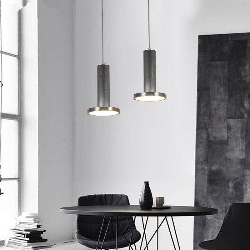 pendant light design in tube and disc Originality