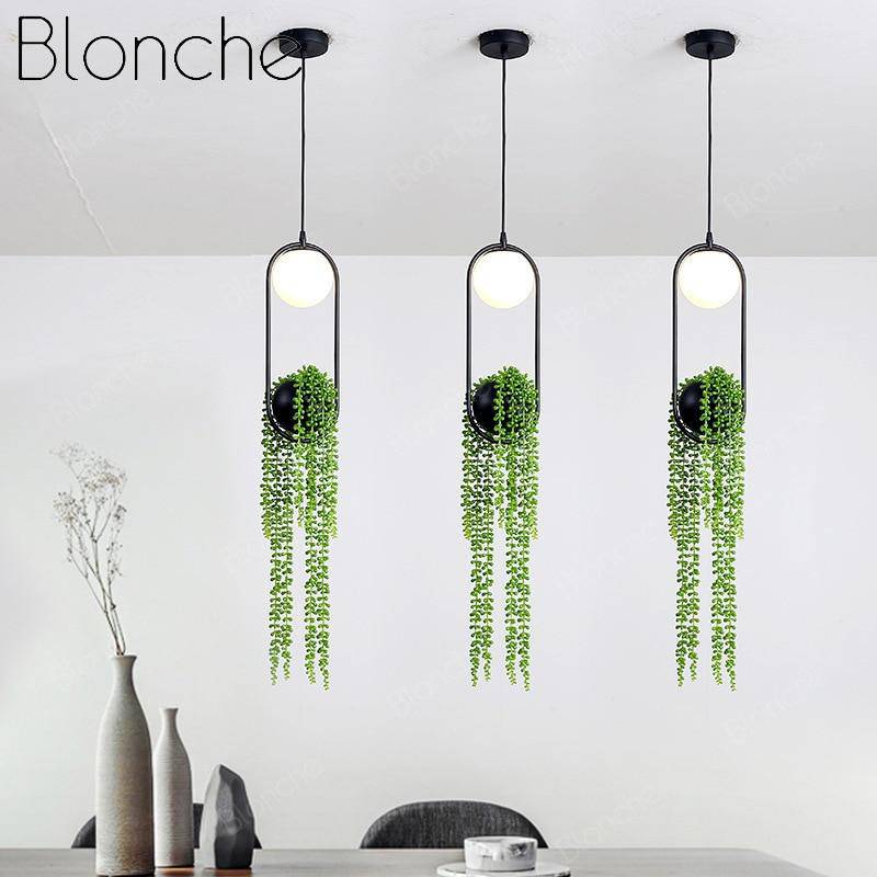 Suspension design LED avec boule en verre et fleurs suspendues