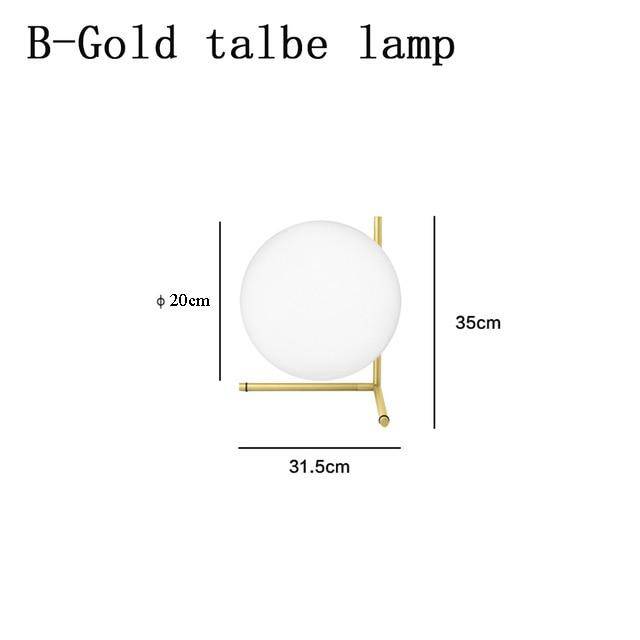 Lampe de chevet design dorée avec boule en verre Lampen