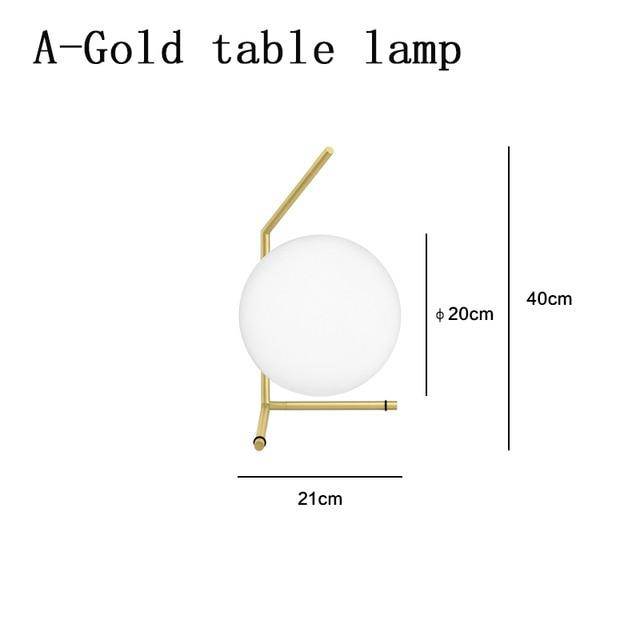 Lampe de chevet design dorée avec boule en verre Lampen