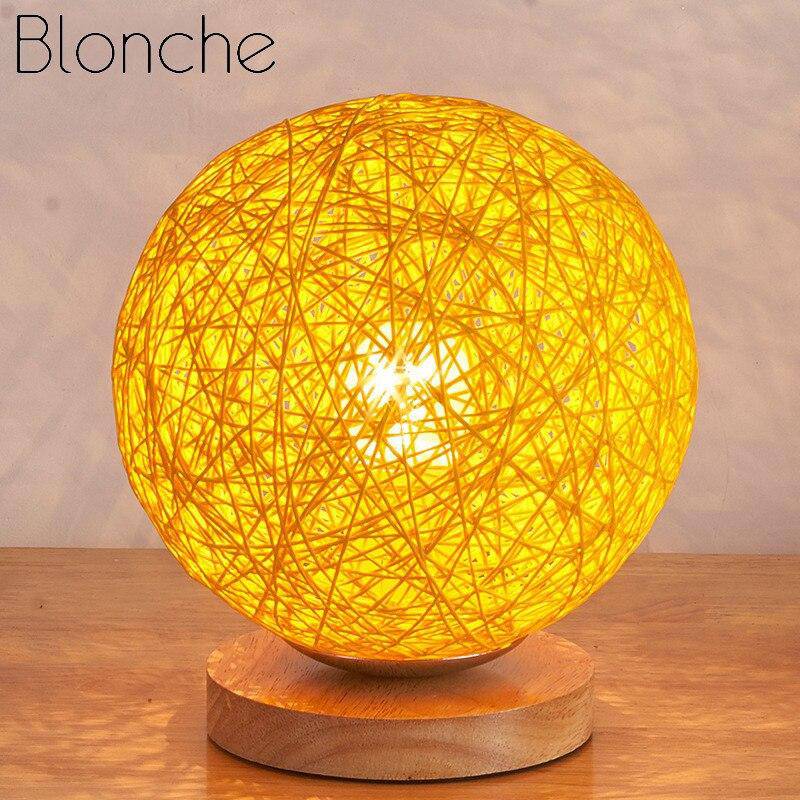 LED table lamp with wooden base and fabric ball in Wicker colour