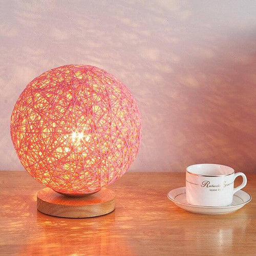 LED table lamp with wooden base and fabric ball in Wicker colour