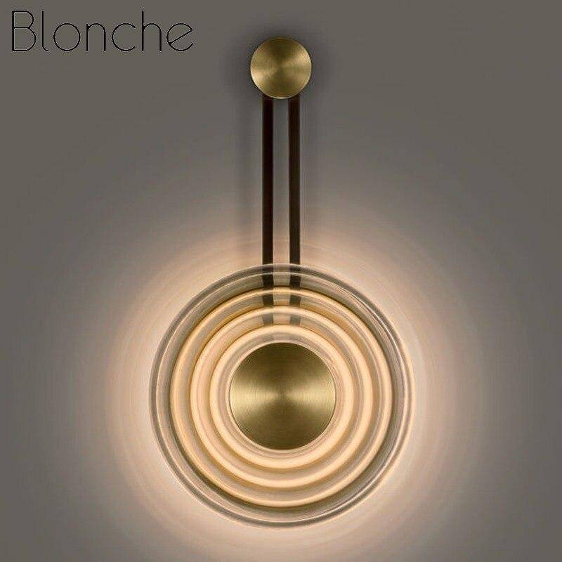 Lámpara de pared design LED con círculo dorado y disco de vidrio Sconce