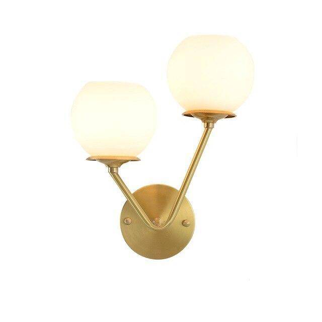 Lámpara de pared design LED en metal dorado con doble bola de cristal