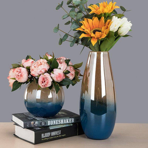 Vase design bleu et doré aux formes arrondies style Luxury