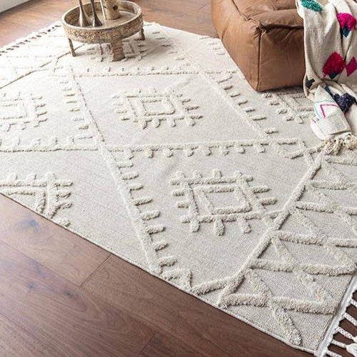 Tapis rectangle berbère blanc à motifs en relief et franges