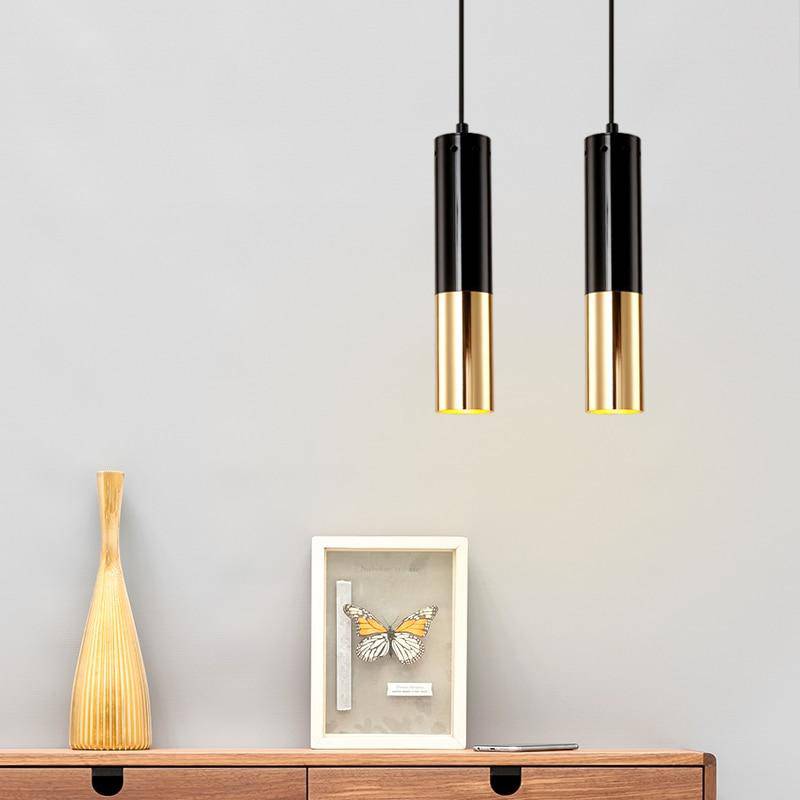 Lámpara de suspensión design LED en tubo cilíndrico de metal negro y dorado Faryto