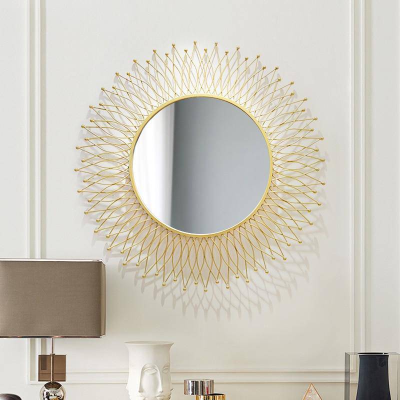 Espejo de pared redondo de metal central dorado