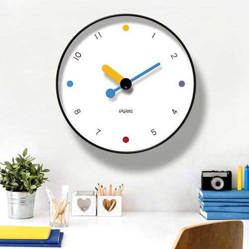 Round wall clock with playful coloured circles Rato