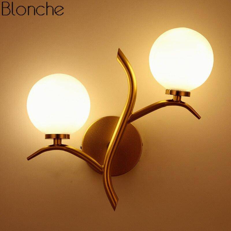 Applique murale design LED dorée avec double boules en verre Luxury