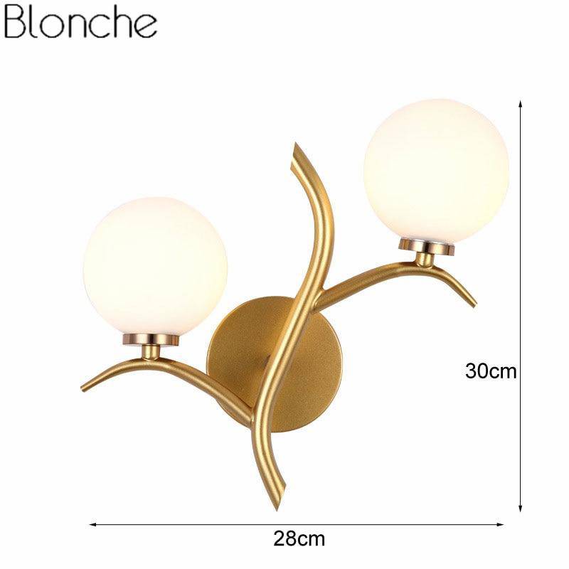 Applique murale design LED dorée avec double boules en verre Luxury