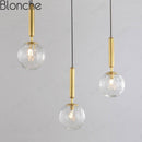 Suspension design LED dorée avec boule en verre Loft