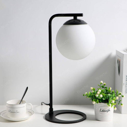 Lámpara de mesa design LED en metal y bola de cristal Sofá