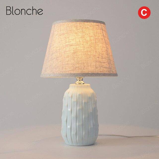 Modern LED table lamp with coloured ceramic base and lampshade fabric