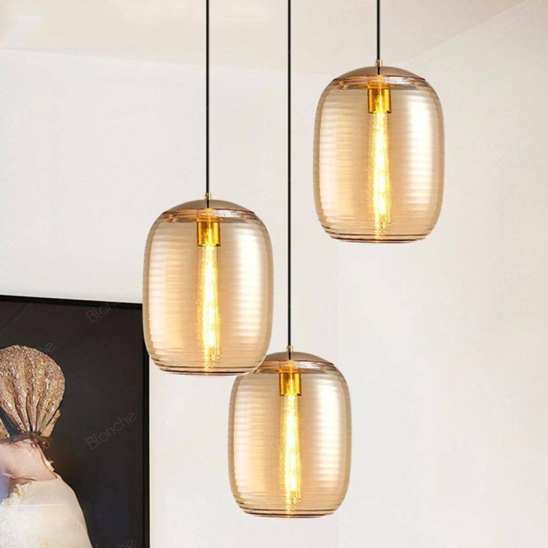 pendant light LED design in oval glass with industrial metal features