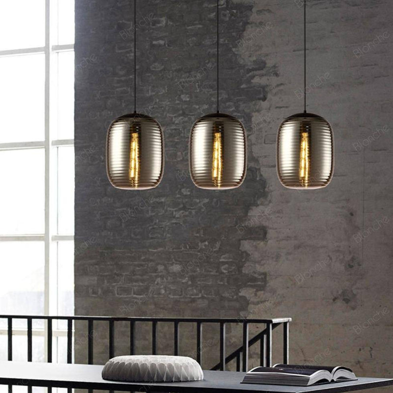 pendant light LED design in oval glass with industrial metal features