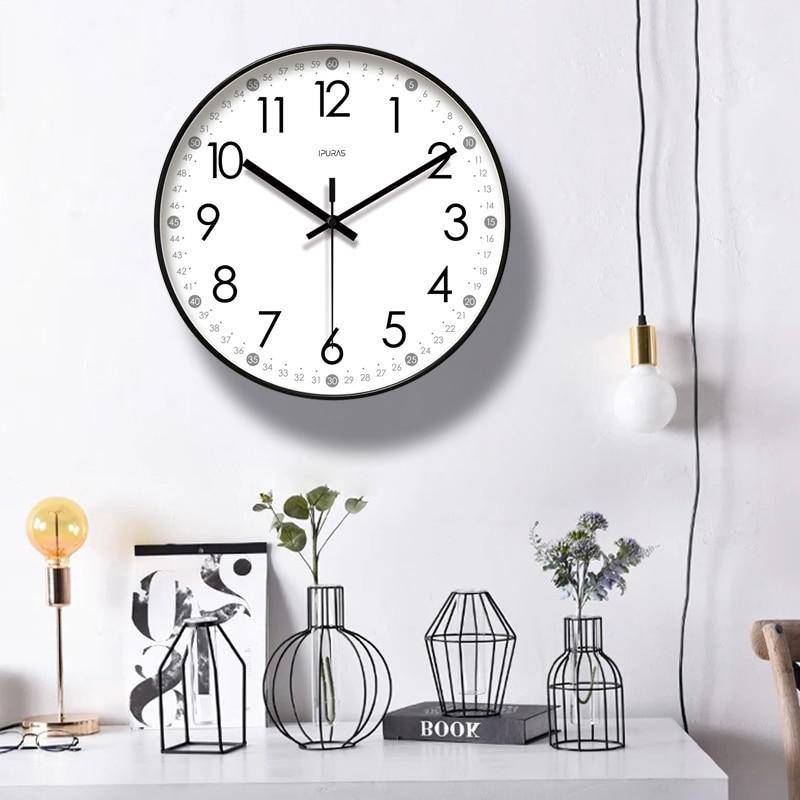 Round wall clock with black numbers Minute
