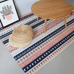 Tapis rectangle aux motifs géométriques roses et noirs style Keecy
