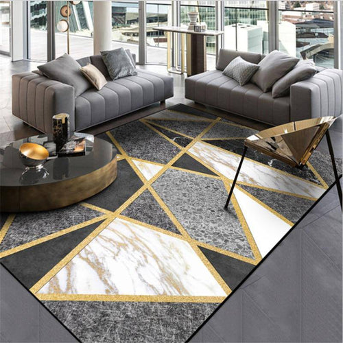 Alfombra moderna rectangular gris y dorada estilo geométrico mármol