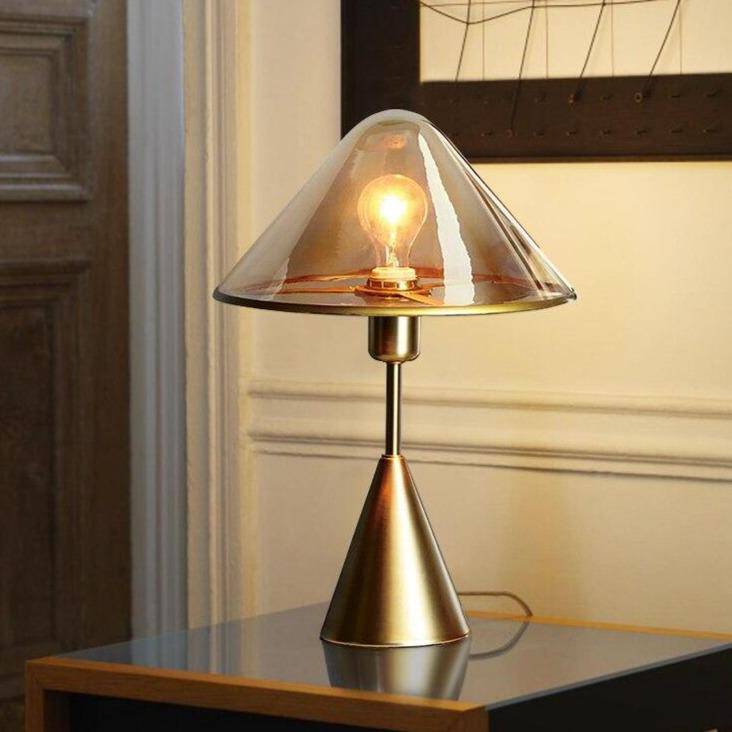 LED design table lamp with conical base in gold metal
