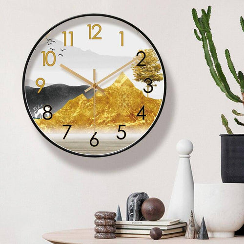 Round wall clock with mountain designs
