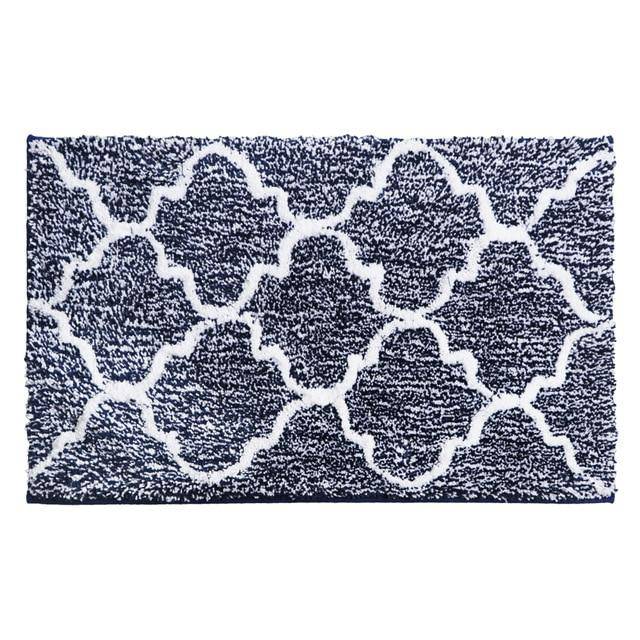 Rectangular coloured microfibre bath mat with Moro pattern