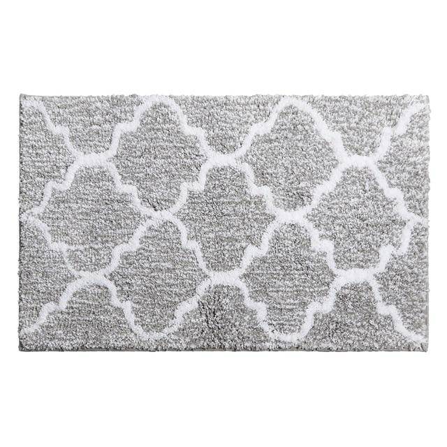 Rectangular coloured microfibre bath mat with Moro pattern