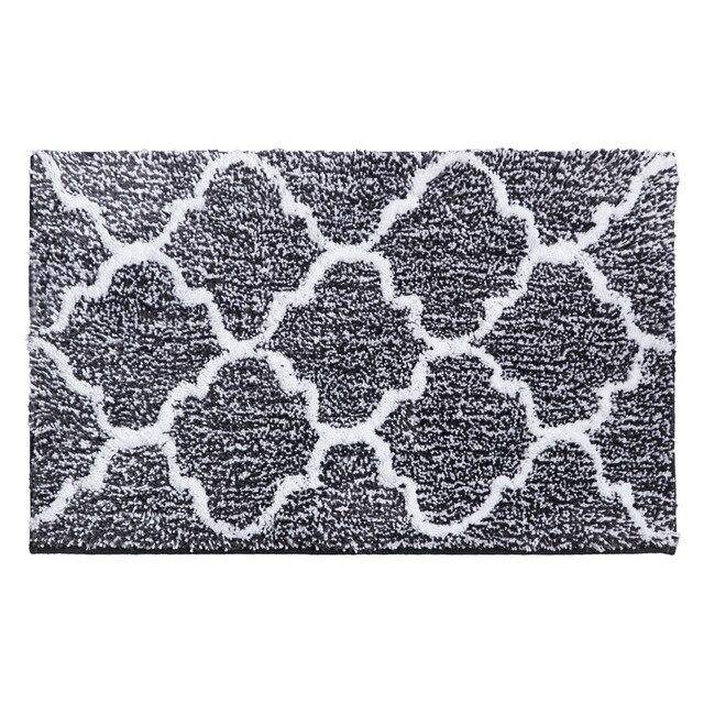 Rectangular coloured microfibre bath mat with Moro pattern