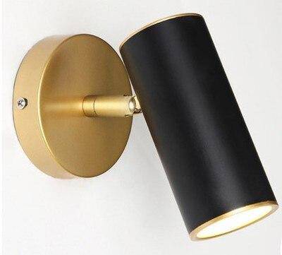 Lámpara de pared design LED con deporte orientable en metal dorado o negro Luz