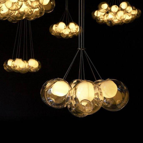 Lustre design LED avec boule en verre déformé style Chandeliers