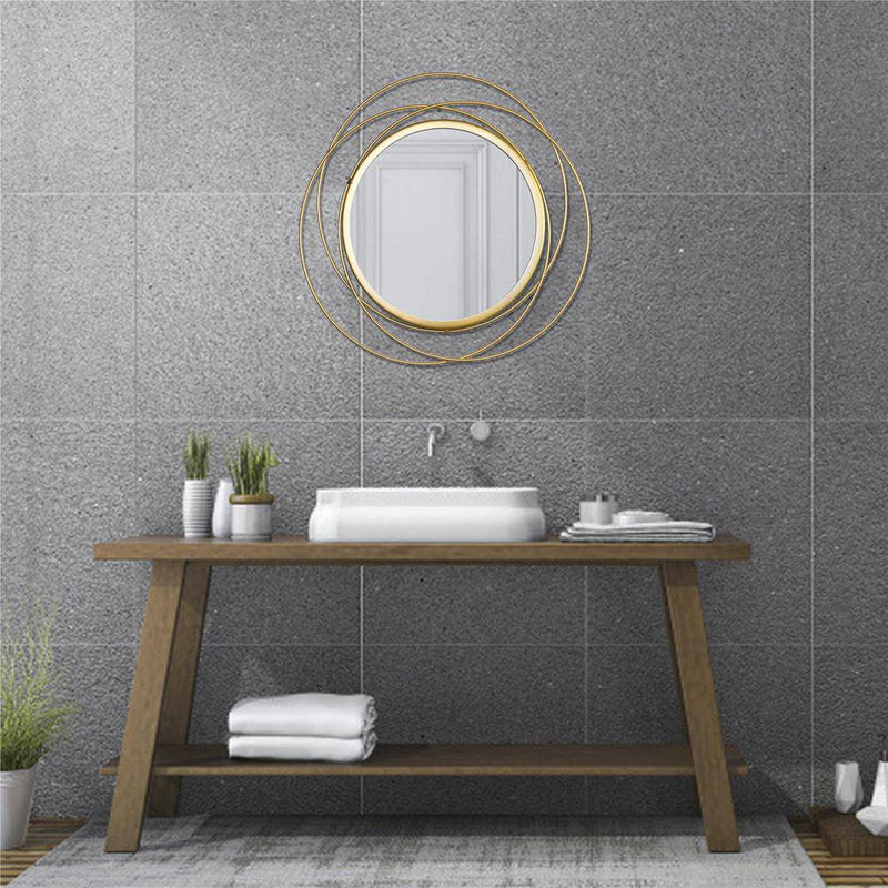 Round wall mirror with gold rings