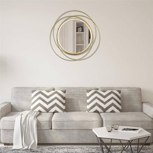 Round wall mirror with gold rings