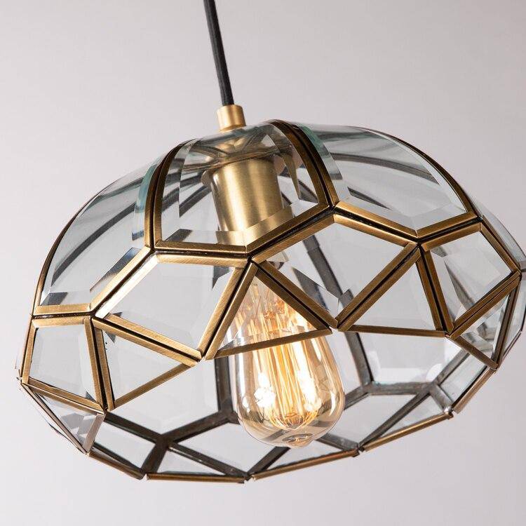 Lámpara de suspensión design LED con cristal geométrico y pantalla de metal dorado