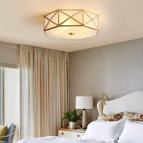 Retro LED ceiling light in gold with octagonal shape in metal