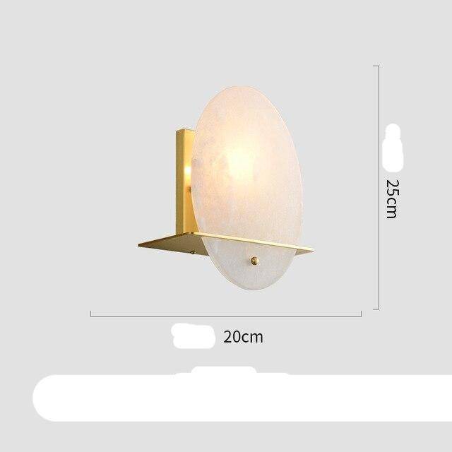 Aplique design LED redondeado en metal dorado y mármol