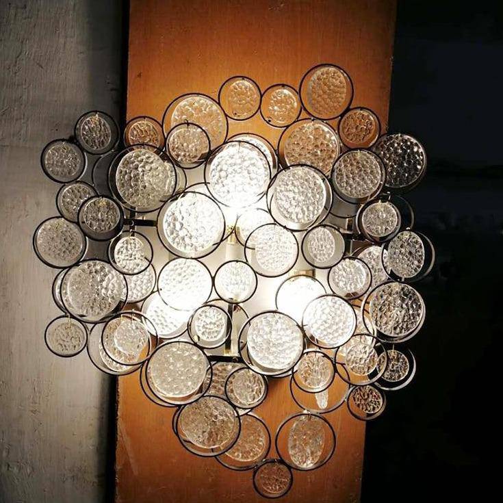 Lámpara de pared design LED con varios círculos de cristal