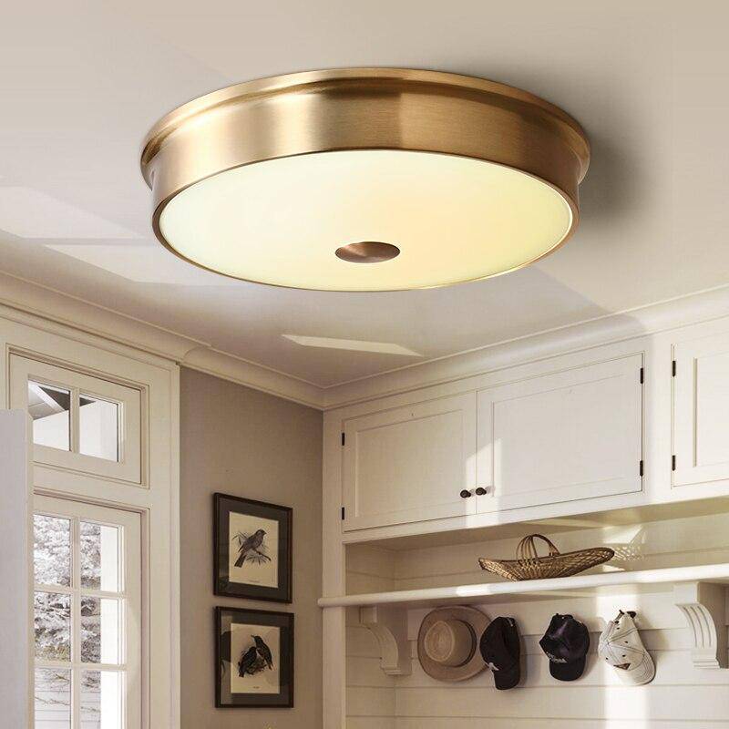 Round LED ceiling lamp in gold metal