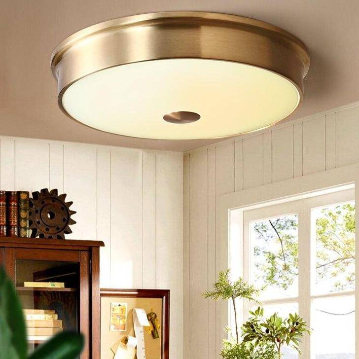Round LED ceiling lamp in gold metal