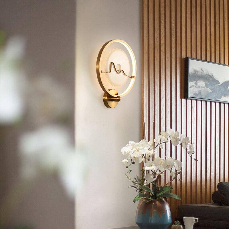 Lámpara de pared design LED en mármol con círculo dorado Lujo