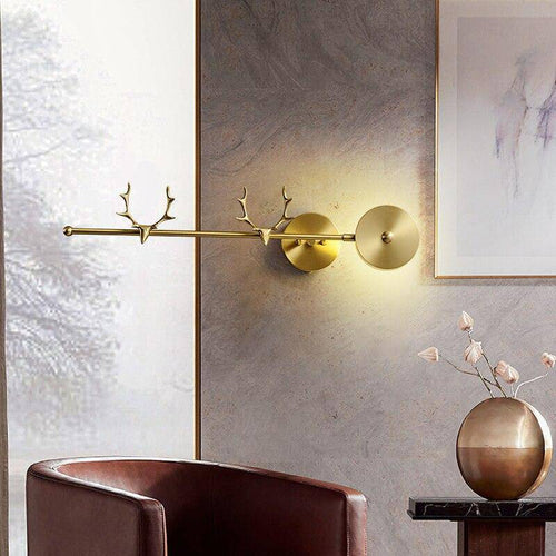 Lámpara de pared design LED con cuernos de ciervo dorados
