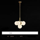 Suspension design LED dorée avec boules en marbre