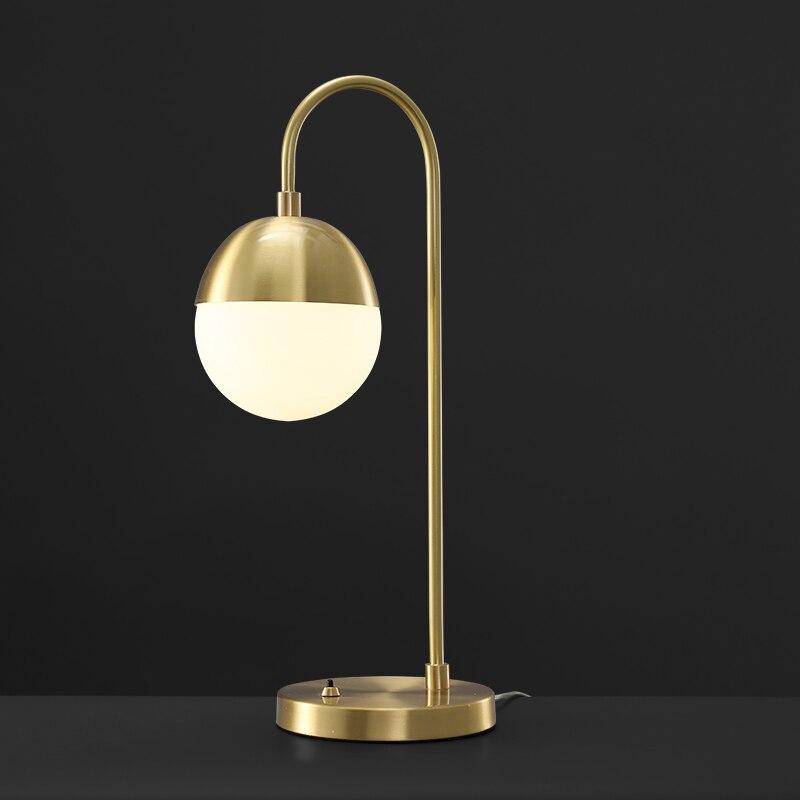LED design table lamp with gold arm and glass ball Soft