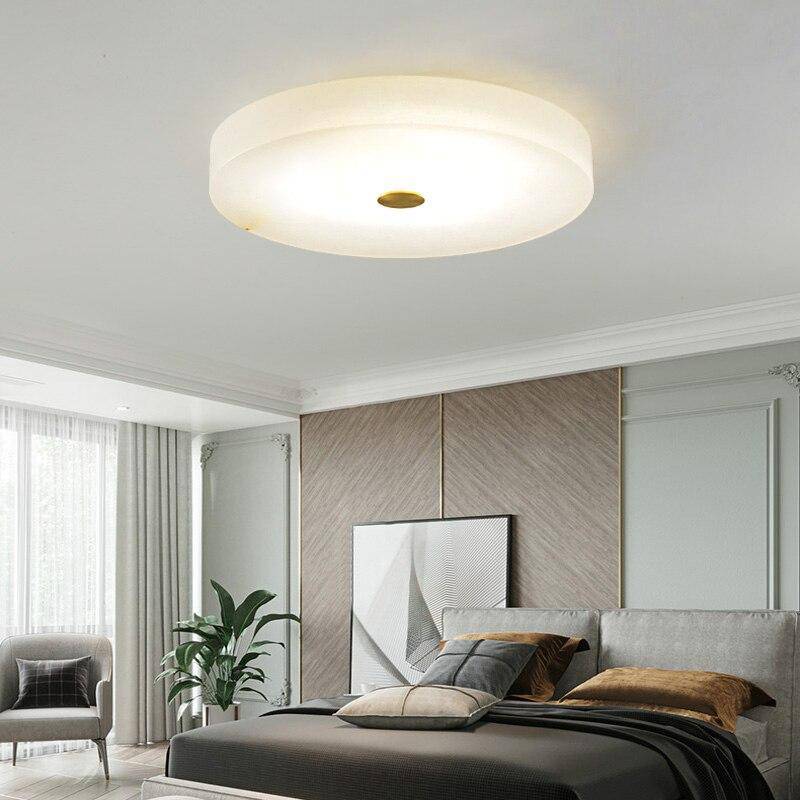 Plafonnier design LED marbre arrondi avec disque doré Villa