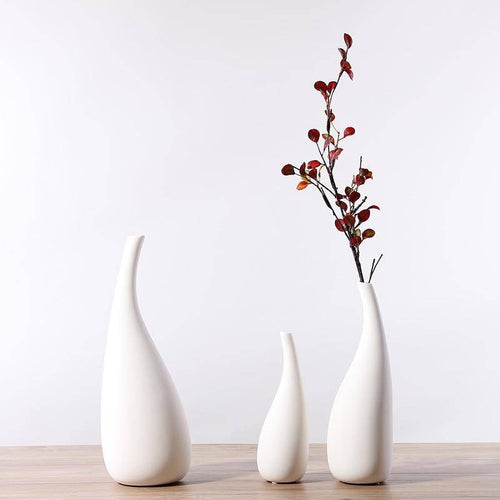 Rounded white ceramic vase modern style